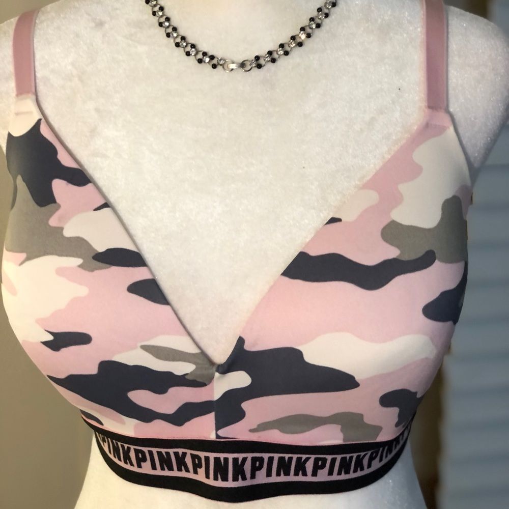Pink Victoria’s Secret 34DD wireless sports bra. Never worn